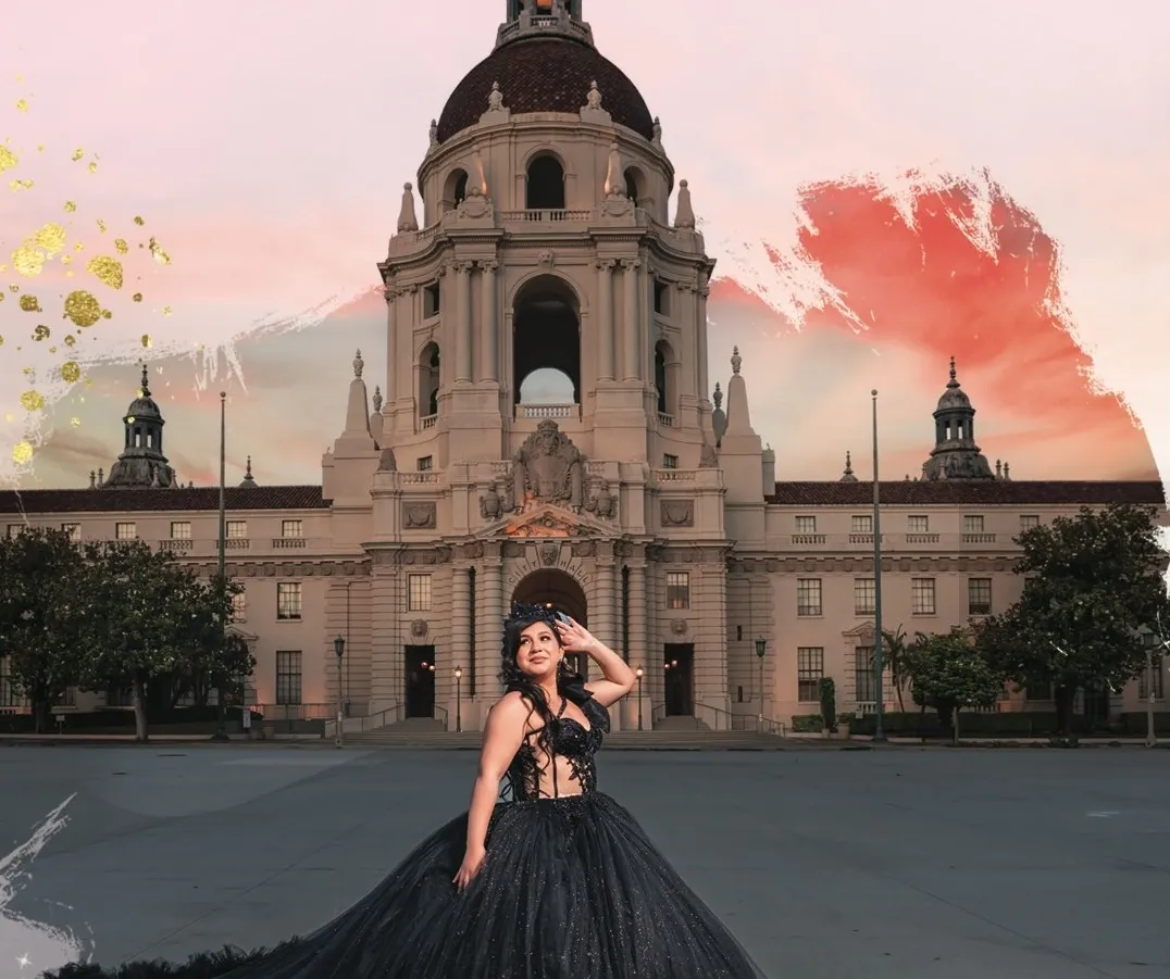 Quinceañera in a black gown in front of Pasadena City Hall